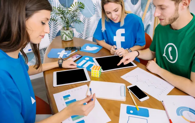 creative team having social media discussion